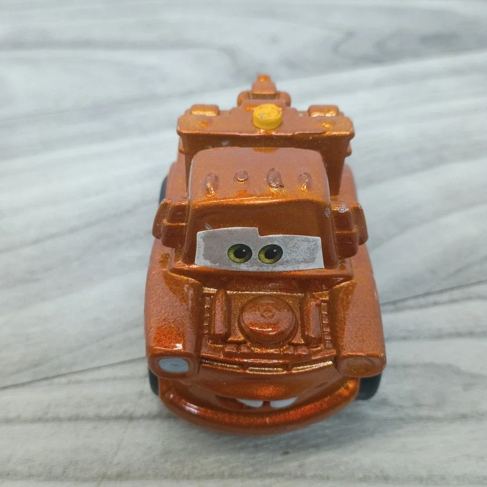 Rare 2011 Disney Pixar Cars Metallic Tow Mater Wheelies Figure FisherPrice Shiny
